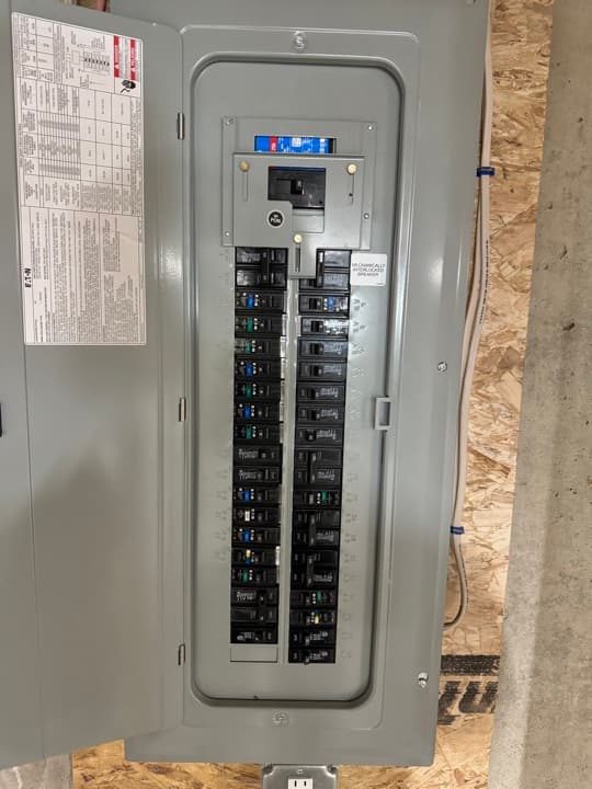 Residential Eaton CH-series main panel installed and labeled.